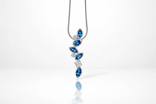 Garnet and London Blue Topaz pendant in sterling silver, style P3844