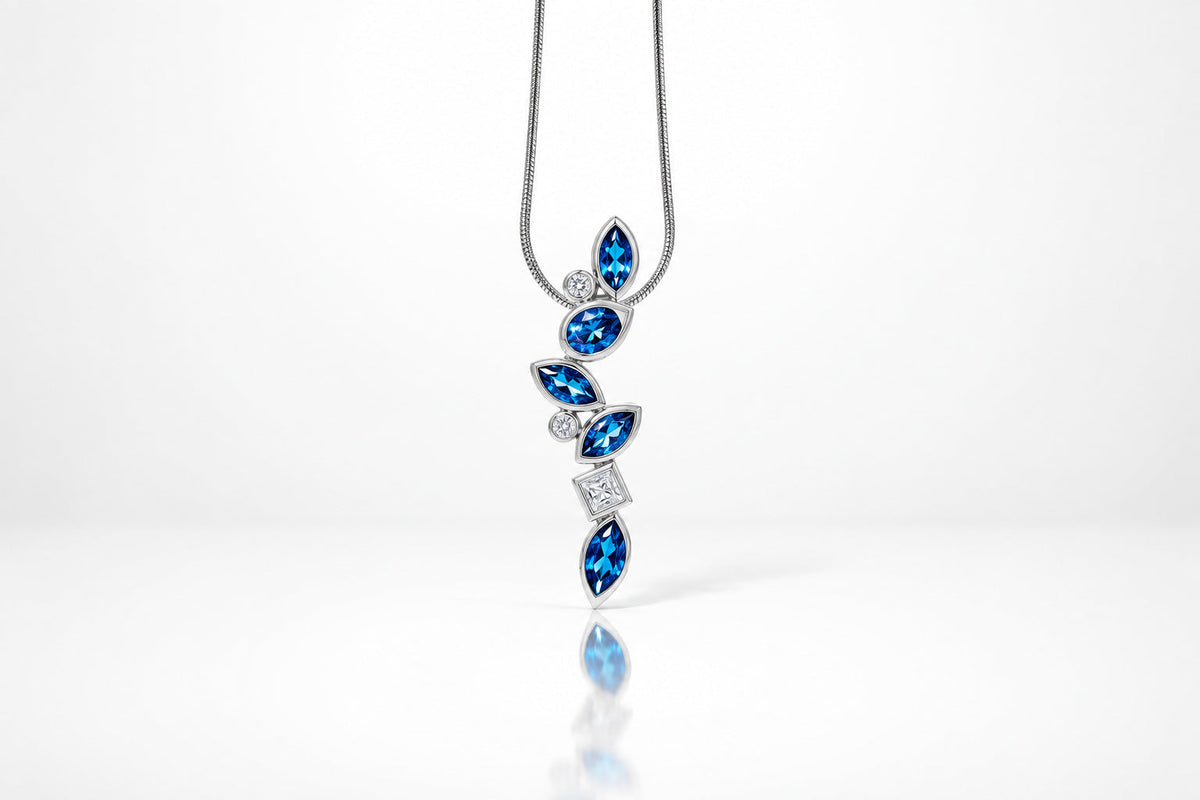 Garnet and London Blue Topaz pendant in sterling silver, style P3844