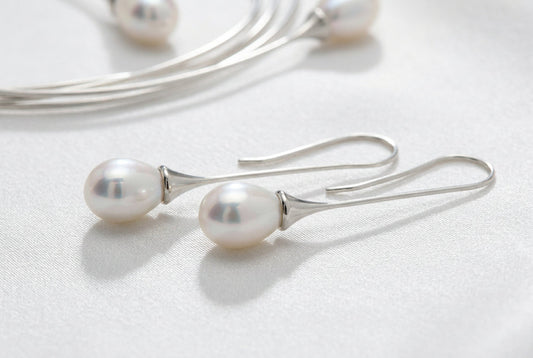 Pearl earrings in sterling silver by Joryel Vera, style E6839