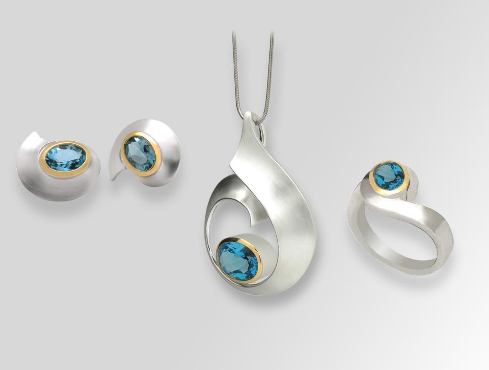 Blue Topaz and Garnet jewelry set in sterling silver