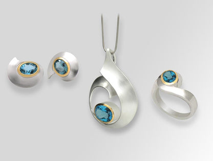 Blue Topaz and Garnet jewelry set in sterling silver