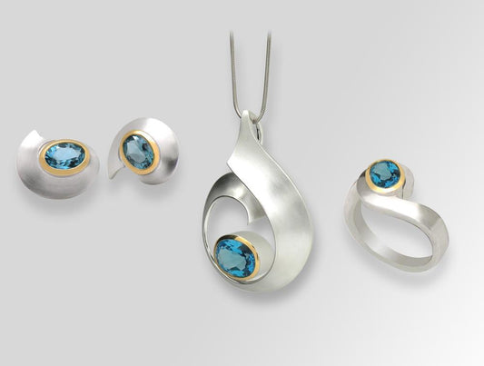 Blue Topaz and Garnet jewelry set in sterling silver